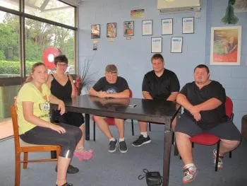 Myhorizon Lifestyle Participant Advisory Group sitting around table for a meeting discussing new ideas and projects